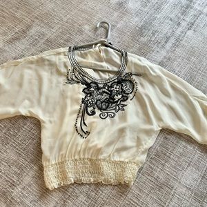 Beautiful ivory silk blouse with black embroidery and beading.